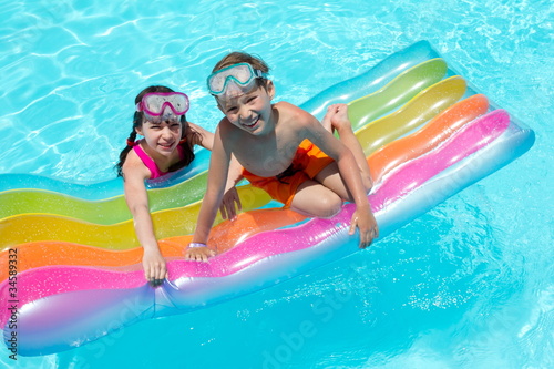 Photo: Children on air mattress Children on air mattress