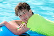 Happy boy in pool