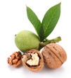 Photo: Green walnut; peeled walnut and its kernels. Green walnut; peeled walnut and its kernels.