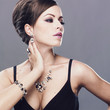Beautiful woman with evening make-up. Jewelry and Beauty