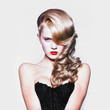 Beautiful blond woman with elegant black dress