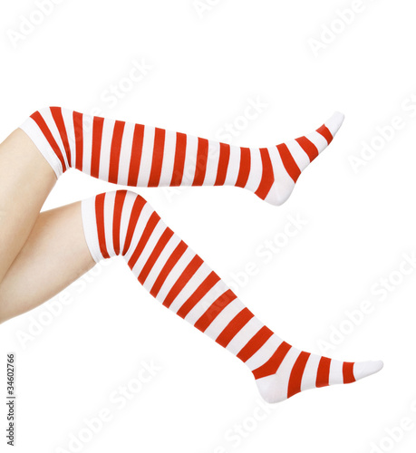 Photo: woman legs in color red and white socks woman legs in color red and white socks