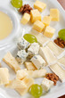 Cheese plate with grapes and honey Cheese plate with grapes and honey