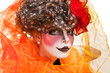 Woman mime with theatrical makeup. Studio shot.
