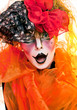 Woman mime with theatrical makeup. Studio shot.