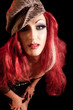 Drag Queen. Man dressed as Woman. On black.