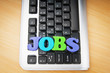 Employment concept with words on keyboard