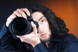 Photographer with the digital camera Photographer with the digital camera