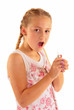 Young girl playing with cigarette lighter