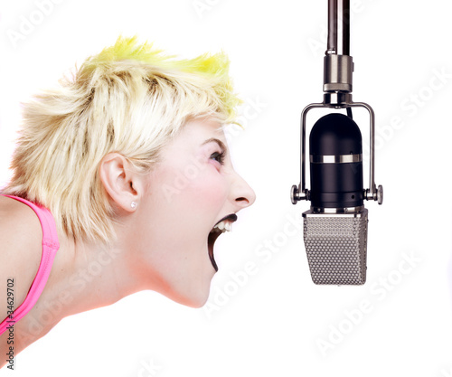 Photo: Punk Girl Shouting at the Microphone Punk Girl Shouting at the Microphone