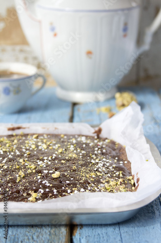 Photo: Brownies with pistachios and sugar pearls in tin Brownies with pistachios and sugar pearls in tin