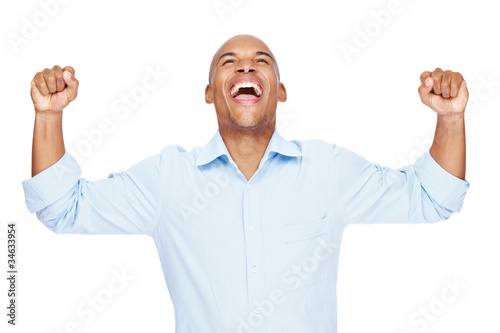 Photo: Overjoyed celebrating Afroamerican businessman Overjoyed celebrating Afroamerican businessman
