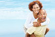 Portrait of excited young couple enjoying their holidays