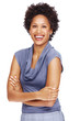 Smiling young woman standing with arms crossed