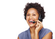 Beautiful female executive wearing headset and smiling