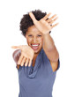 Excited woman pointing with both hands towards you