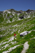 Hiker in the mountains, Allgäu Alps, Bavaria, Germany Hiker in the mountains, Allgäu Alps, Bavaria, Germany