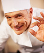 Smiling chef with positive gesture