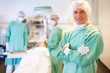 Confident male surgeon in operation theater