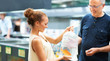 Female customer buying live fish