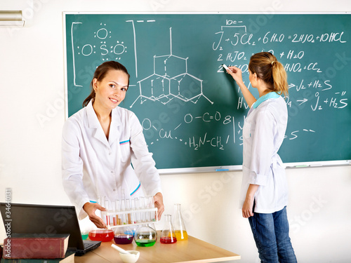 Photo: Female student with flask. Female student with flask.