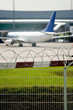 Airport security, razor wire soft focus view Airport security, razor wire soft focus view