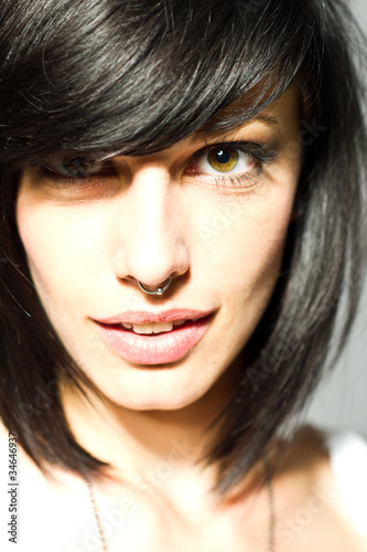 Photo: young woman with piercing young woman with piercing