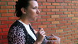 Woman eating at the balcony at lunch break - 1080HD