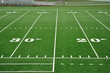 Photo: Twenty and Thirty Yard Line on American Football Field Twenty and Thirty Yard Line on American Football Field