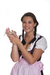 Frau in Tracht, mit Gerbil auf der Hand