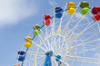 Ferris wheel detail on a blue sky