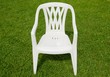 White chair in the garden White chair in the garden