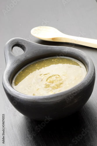 Photo: tomatillo sauce in colombian clay dish tomatillo sauce in colombian clay dish