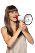 Portrait of beautiful female proclaiming into the loudspeaker