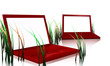 Illustration: red designer laptops and grass red designer laptops and grass