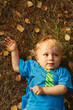 baby lying on grass