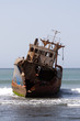 Old ship in the shallows near the shore Old ship in the shallows near the shore