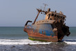 Old ship in the shallows near the shore Old ship in the shallows near the shore