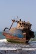 Old ship in the shallows near the shore Old ship in the shallows near the shore