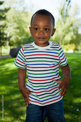 Photo: Cute Little african american baby boy playing Cute Little african american baby boy playing