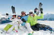 Ski, snow, sun and fun - happy family on ski