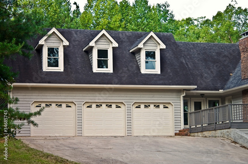 Photo: Triple Garage on a House Triple Garage on a House