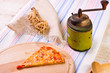 italian slice pizza baked in fire oven with pepper mill