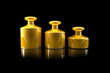 Illustration: Gewichte aus Gold / in Gold aufwiegen Gewichte aus Gold / in Gold aufwiegen