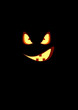 Scary smile, appearing out of the darkness