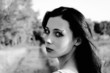 Photo: Portrait of a beautiful young girl. Black and white Portrait of a beautiful young girl. Black and white