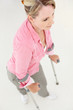 Woman walking with crutches