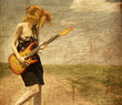 Red-head girl with guitar. Red-head girl with guitar.