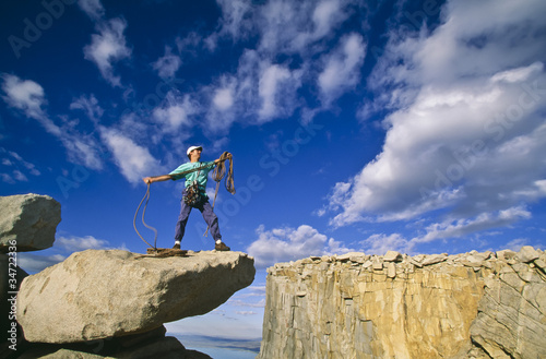 Photo: Rock climber on the summit. Rock climber on the summit.
