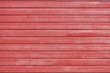 Wall of red plank
